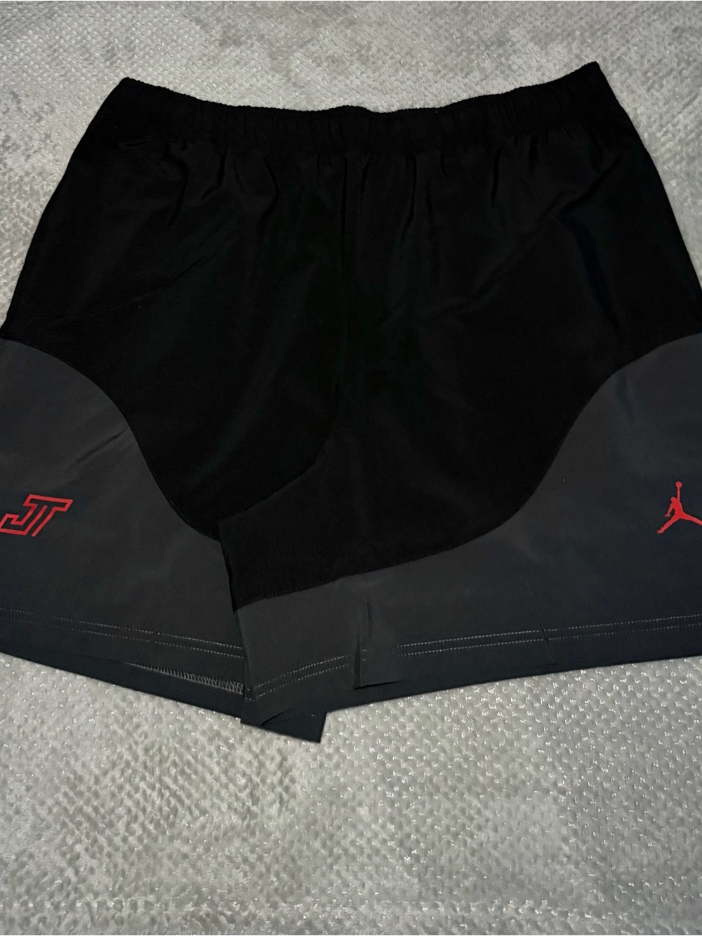 Jordan Men’s Black Athletic Shorts with Red Logo Accents